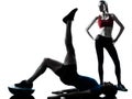 Coach man woman exercising abdominals with bosu Royalty Free Stock Photo