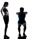 Coach man woman exercising squats on bosu Royalty Free Stock Photo
