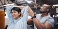 Coach, personal trainer and senior woman stretching arms in gym with black man for flexibility. Physiotherapy, training Royalty Free Stock Photo