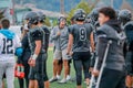 Coach Talking To High School Football Team Royalty Free Stock Photo