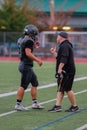 Coach Talking To A High School Football Player Royalty Free Stock Photo