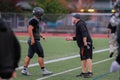 A Coach Talks To One Of His High School Football Players Royalty Free Stock Photo