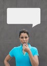 Coach woman with speech bubble against grey background