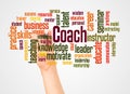 Coach word cloud and hand with marker concept Royalty Free Stock Photo