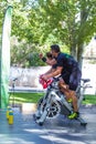 Coaches cheering spinning session outdoors