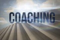 Coaching against steps against blue sky Royalty Free Stock Photo