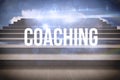 Coaching against steps against blue sky Royalty Free Stock Photo
