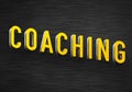 Coaching - black chalkboard background concept Royalty Free Stock Photo