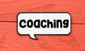 Coaching text on speech bubble and red background