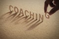 `coaching` wooden letters