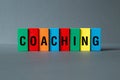 Coaching - word concept on building blocks, text Royalty Free Stock Photo