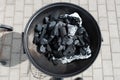 Coal on a barbeque ready to be lit.. Royalty Free Stock Photo