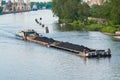 Coal barge sailing on the river Royalty Free Stock Photo