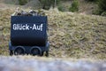 Coal car with the inscription "gluck auf" in the harz mountains Royalty Free Stock Photo