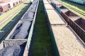 Coal cars, wood chips and sawdust on the train. Global warming. Energy production Royalty Free Stock Photo