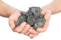 Coal coke in hand on white background