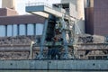 Coal crane with mountains of coal at coal power plant