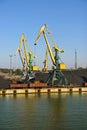 Coal cranes in harbour Royalty Free Stock Photo