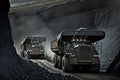 Coal Dump Trucks in an Open Cut Coal Mine. Generative ai