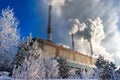 Coal-fired power plant emits smoke and steam in winter Royalty Free Stock Photo