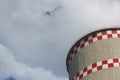 Coal-fired power plant tower blowing white smoke into sky. Royalty Free Stock Photo