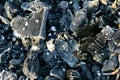 Coal in frost. Frozen coal texture.Heating season.First frosts and colds.coal in hoarfrost close-up Royalty Free Stock Photo