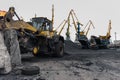 Coal handling operations at the port. Royalty Free Stock Photo