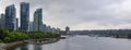 Coal Harbor in Vancouver British Columbia with downtown buildings boats and reflections in the water Royalty Free Stock Photo