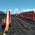 Coal loading unloading barge port yard Royalty Free Stock Photo