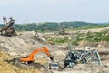 Coal mine accident with a heavy extraction machine inside the coal exploitation. The huge excavator collapsed in the open pit.