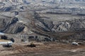 Coal mine with excavator machine Royalty Free Stock Photo