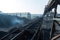 coal mine, with view of conveyor systems and mining equipment, transporting coal to the surface Royalty Free Stock Photo