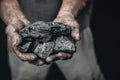 Coal in miner holds. Concept industry mining