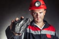 Coal miner showing lump of coal Royalty Free Stock Photo