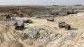 Coal mining open pit with many large trucks for coal transporting in South Africa Royalty Free Stock Photo