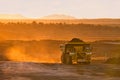 Coal mining truck in orange morning light Royalty Free Stock Photo