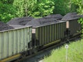 Coal piled in railroad cars Royalty Free Stock Photo