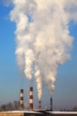 Coal plant smoke stacks. Royalty Free Stock Photo