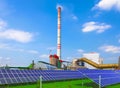 Coal power plant with energy solar panels Royalty Free Stock Photo