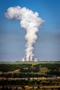 Coal power plant factory chimney emissions causing air pollution Royalty Free Stock Photo