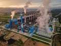 Coal power plant with steam pouring out of the stack. Royalty Free Stock Photo