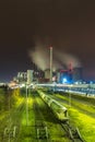 Coal power station with freight depot at night Royalty Free Stock Photo