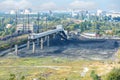 Coal supply to the city CHP plant against the background of the railway and the cityscape