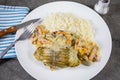 Coalfish fillet cooked in sauce Royalty Free Stock Photo