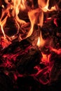 Coals in a fire close-up at night Royalty Free Stock Photo