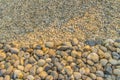 Coarse and fine river gravels for background. Big and small river pebbles texture background.