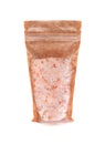 Coarse Himalayan salt in a brown paper bag. Doy-pack with a plastic window for bulk products. Close-up. White background. Isolated