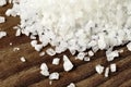 Coarse salt on a old wooden table Royalty Free Stock Photo