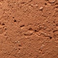 Coarse-textured surface of reddish-brown clay soil, slightly compacted with irregular Royalty Free Stock Photo