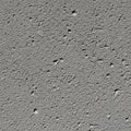 Coarse, textured surface resembling concrete or cement. The surface is filled with Royalty Free Stock Photo